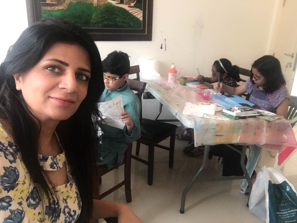 Artist Aparna Shere with her students